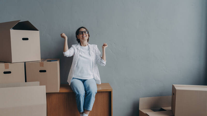 young woman happy in her new home